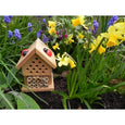 Make your own insect house, the house is built and in a garden,