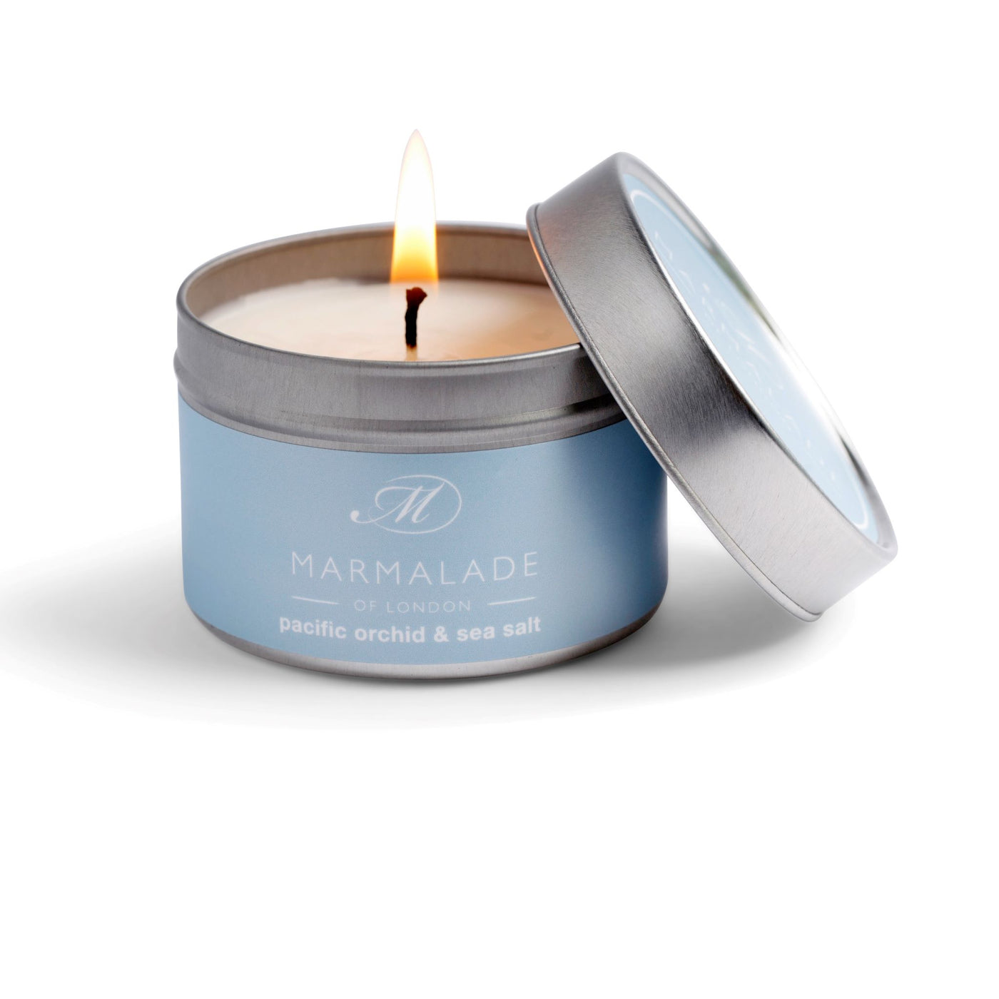 Pacific Orchid and Sea Salt small candle in a pale blue tin with lid.